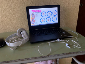 Fotografía de una computadora con la proyección del juego interactivo realizado por los alumnos